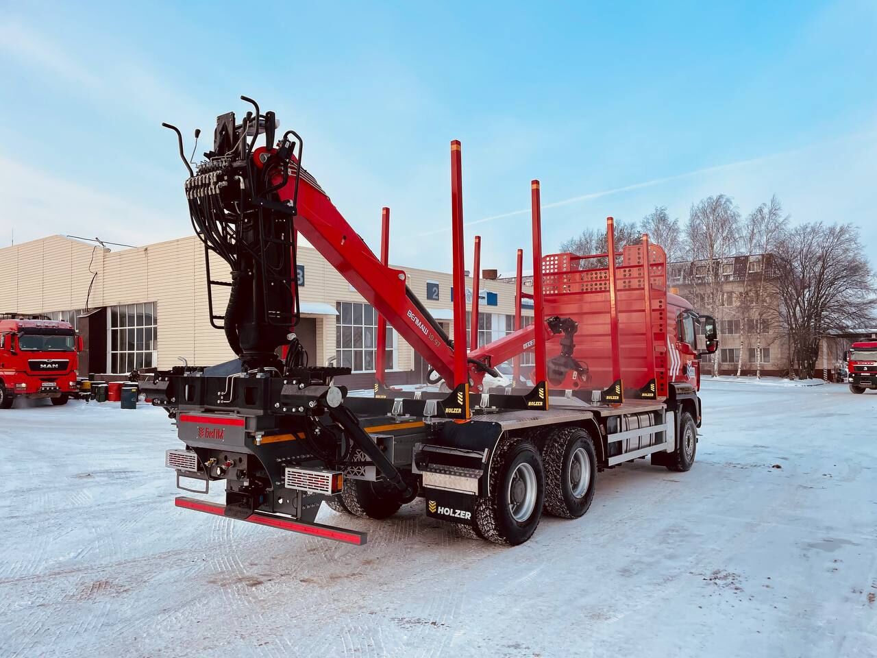 Лесовоз Sitrak C7H 6х4 с КМУ Велмаш ВМ10-86